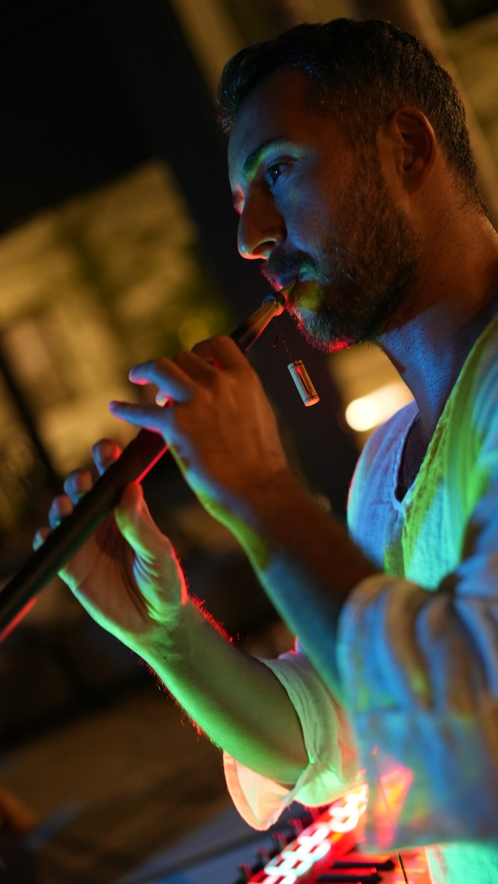 Alp Akmaz looking upward while playing